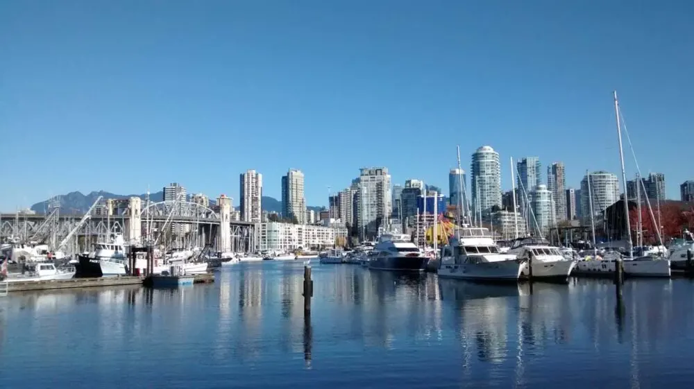 Harbour view of Vancouver with boats and high rise buildings