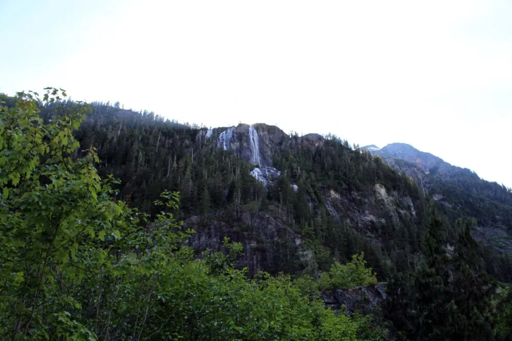 A distance view of Della Falls cascading down the mountain