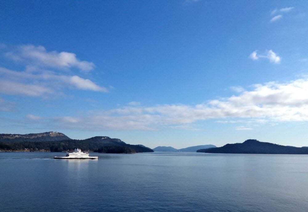 A car ferry sailing between islands