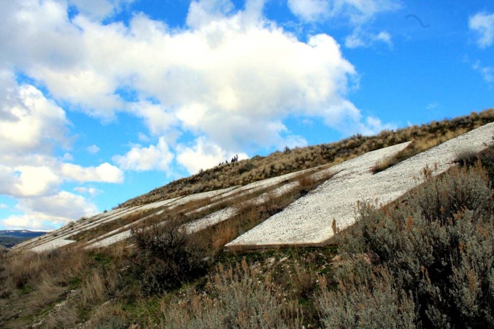 Close up of white Penticton sign on side of Munson Mountain