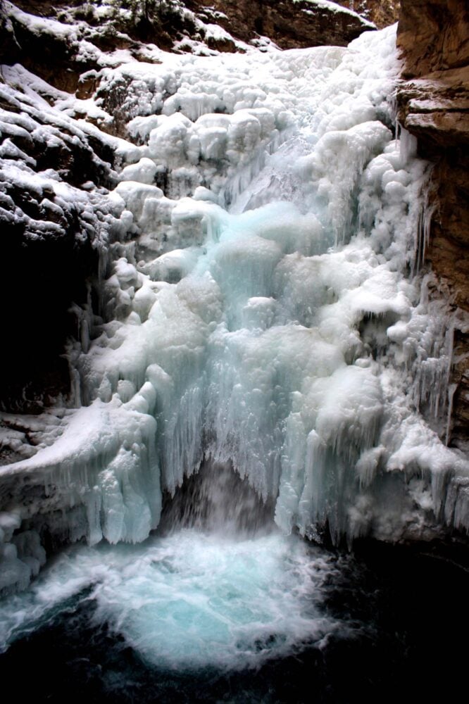 Unmissable Stops on a Canadian Rockies Road Trip - Johnstone Canyon in winter