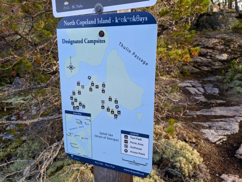 BC Parks sign with map of island with tent pads