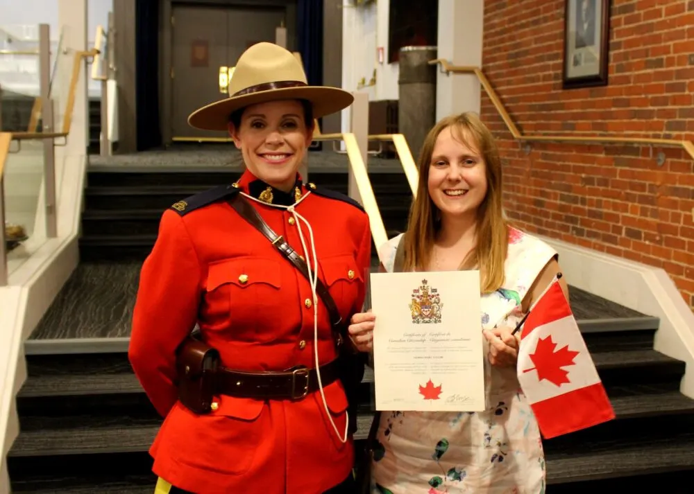 Gemma with mountie at Citizenship Oath Ceremony