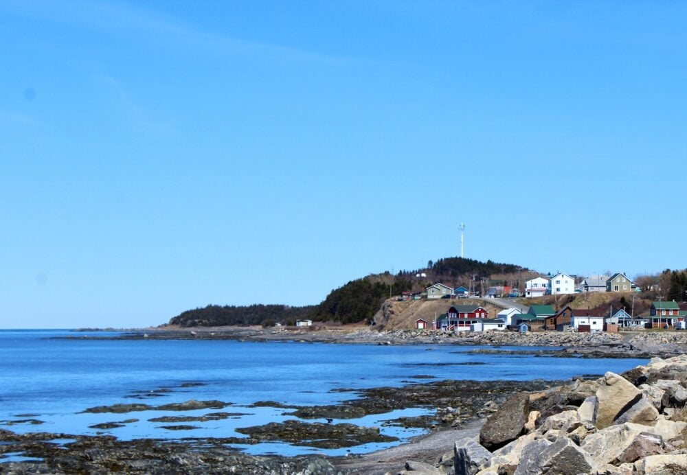 Coastal views on the Gaspe Peninsula with headland and houses