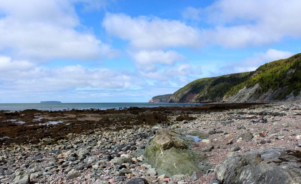 Looking across a rocky beach on the Cape Chignecto Coastal Trail