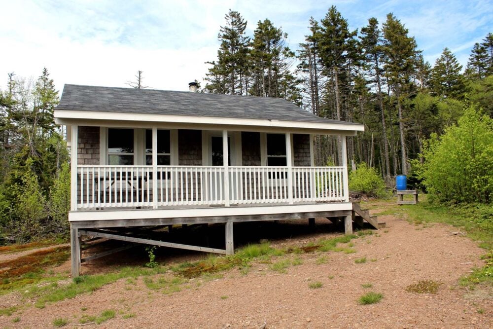 Small elevated cabin with sloping roof on the Cape Chignecto Coastal Trail