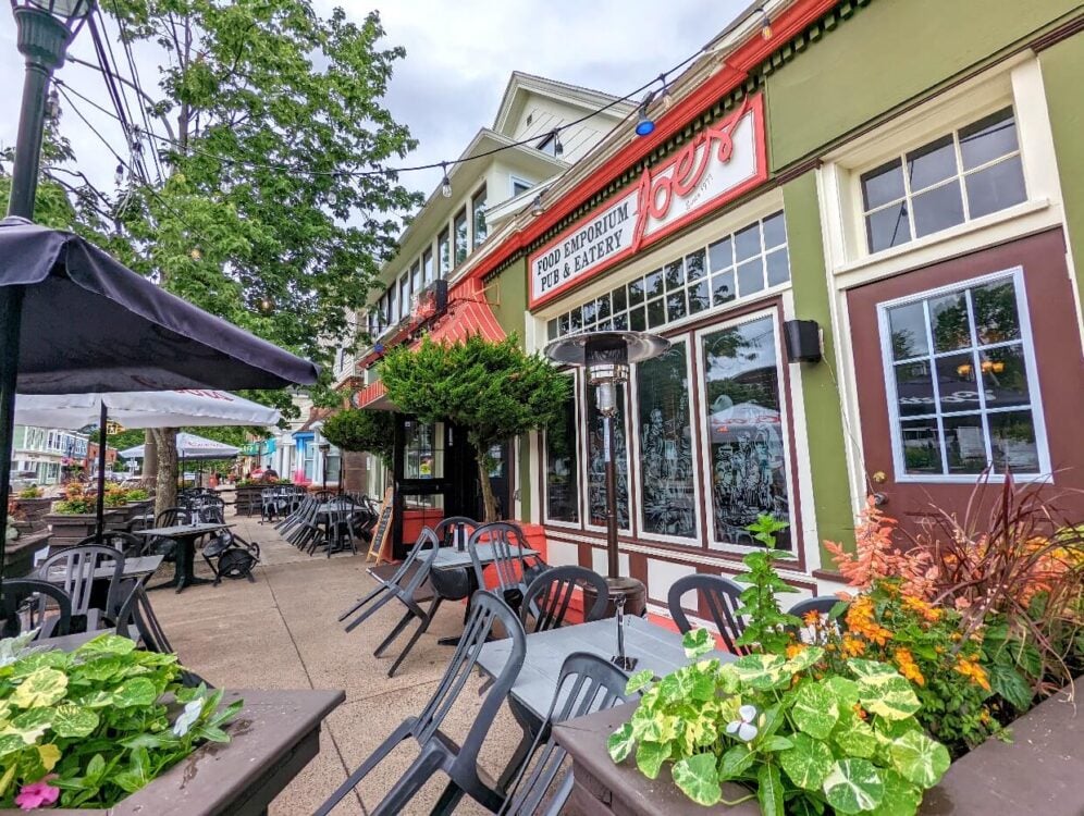 Side view of Joes Food Emporium in downtown Wolfville, which featured a large patio and colourful frontage