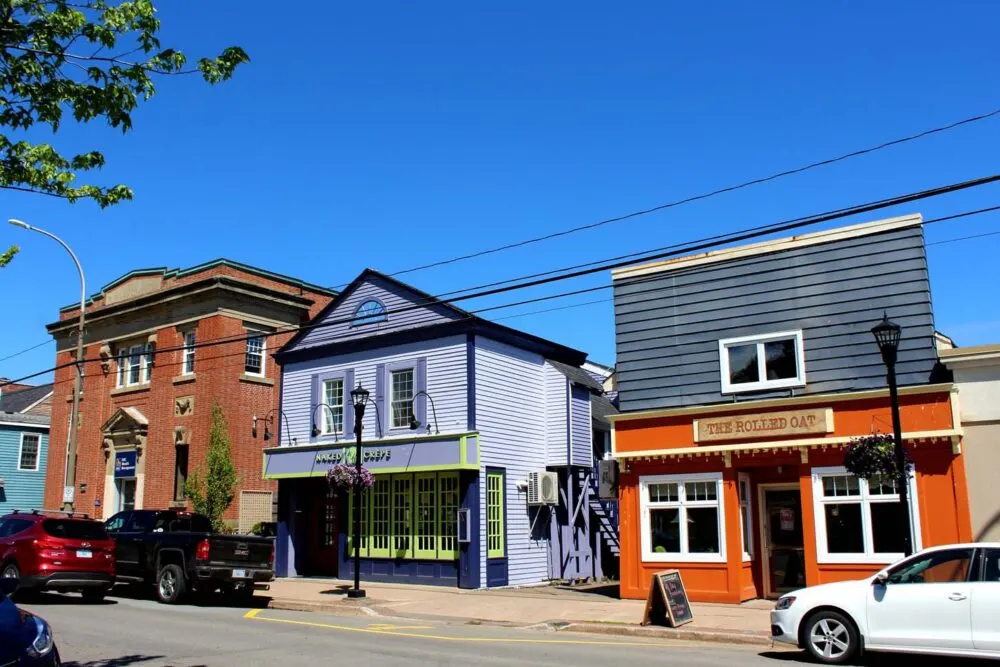 Looking across the street in downtown Wolfville, Nova Scotia, looking over to colourful downtown buildings
