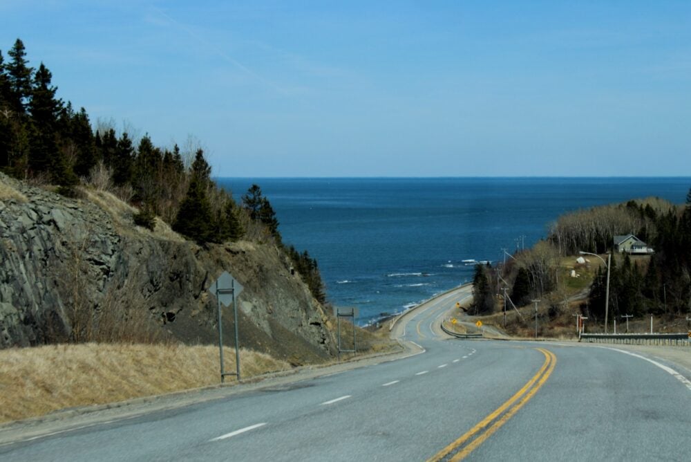 Highway turning and following coast closely on Gaspe Peninsula