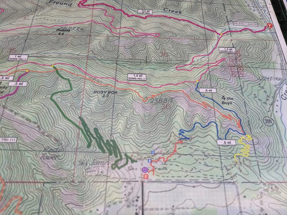 Topographic map with coloured trails