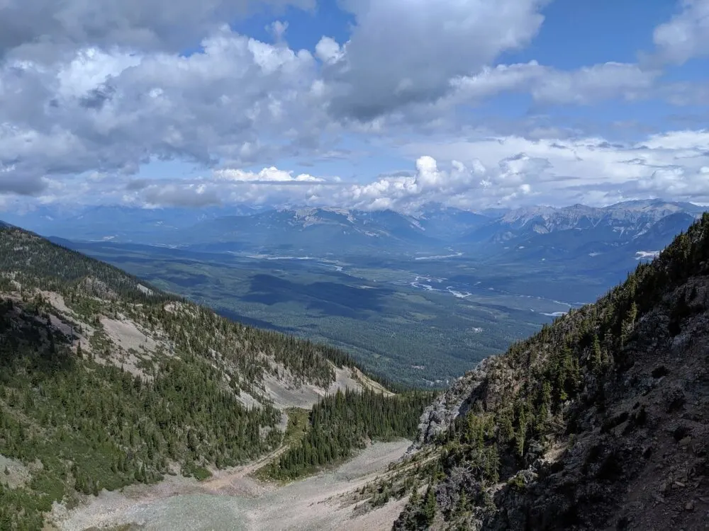 Views from Kicking Horse's Via Ferrata course of mountain peaks and a river valley