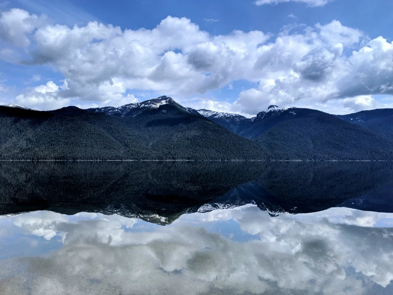 Mirror like effect on alpine lake in Wells Gray Provincial Park