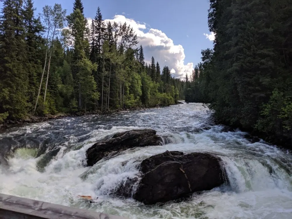 River rapids with rocks as seen from a bridge