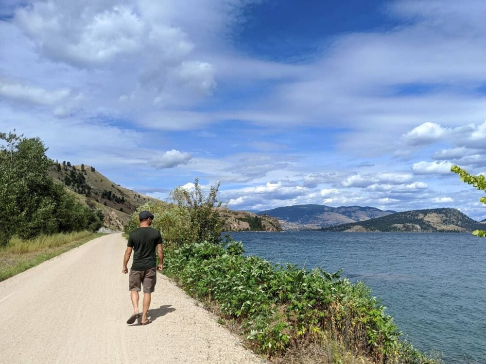 JR walking on Okanagan Rail Trail near Vernon, following Kalamalka Lake