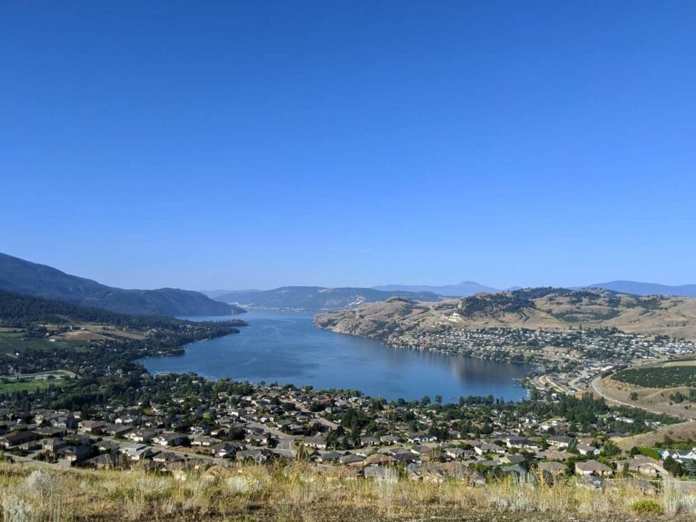 Elevated view from Middleton Mountain looking down at housing estate and Kalamalka Lake below