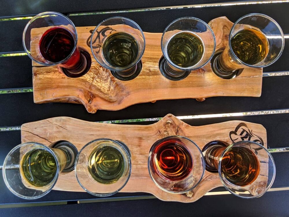 Birds eye view of BX Press cider flights with eight different variations