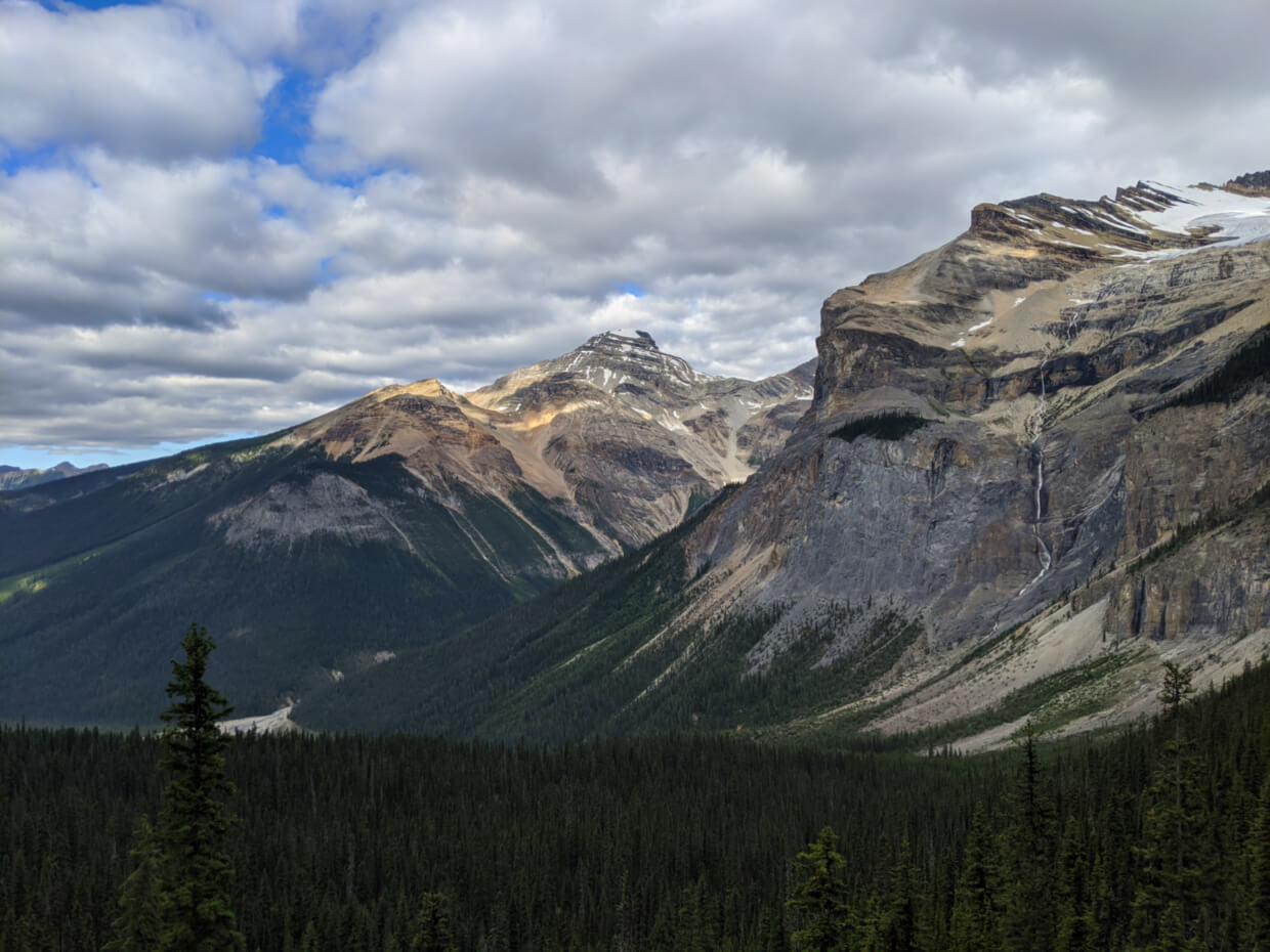 Rugged mountain view from Walcott Quarry trail, with Emerald Glacier and waterfall