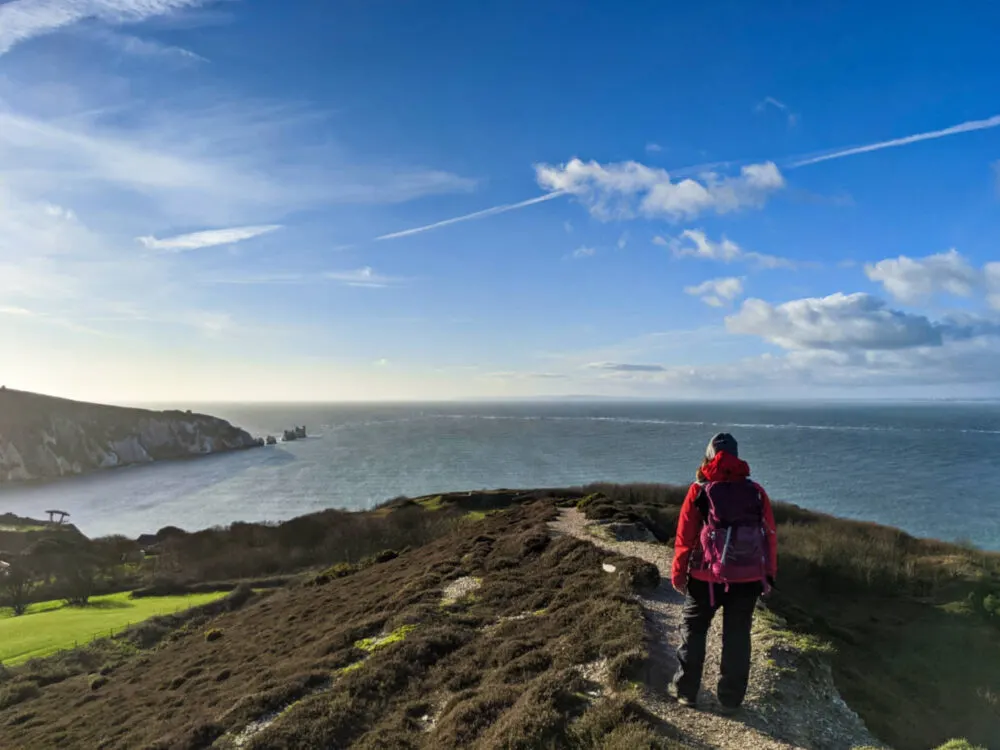 Gemma looking out to views of the Needles from Headon Warren on the Isle of Wight