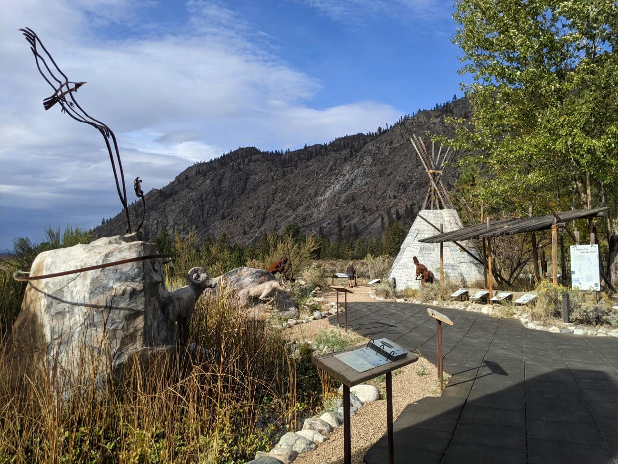 Looking towards animal status, teepee and interpretive displays at Nk'Mip Desert Cultural Centre