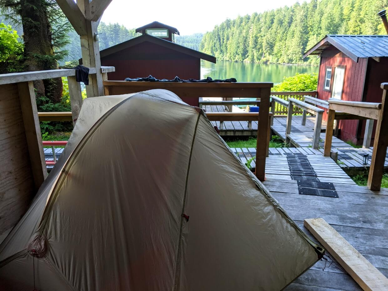 Set up tent on Nitinaht Narrows covered tent deck at the Crab Shack