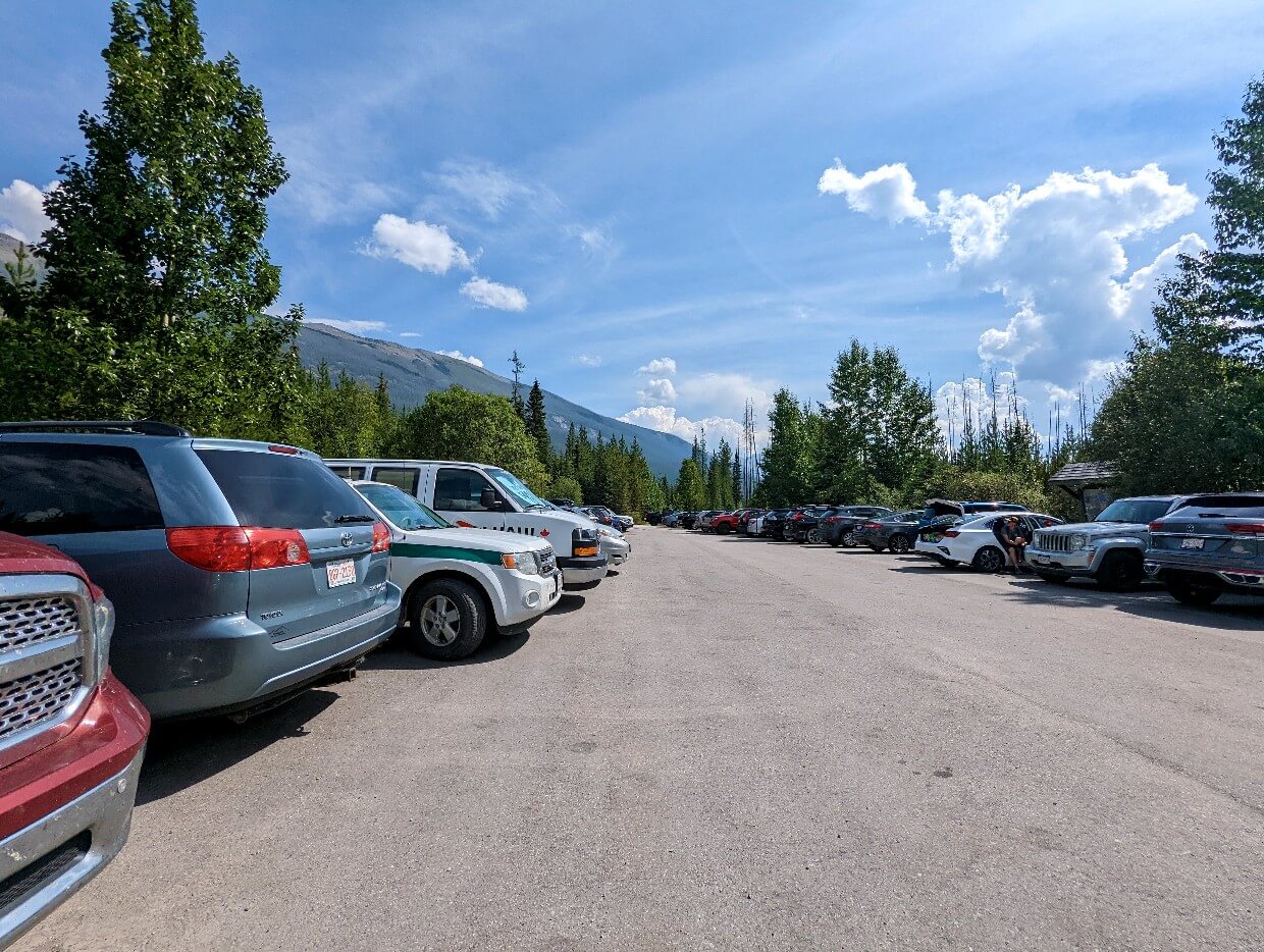 Parked cars in Floe Lake parking lot on the Rockwall Trail