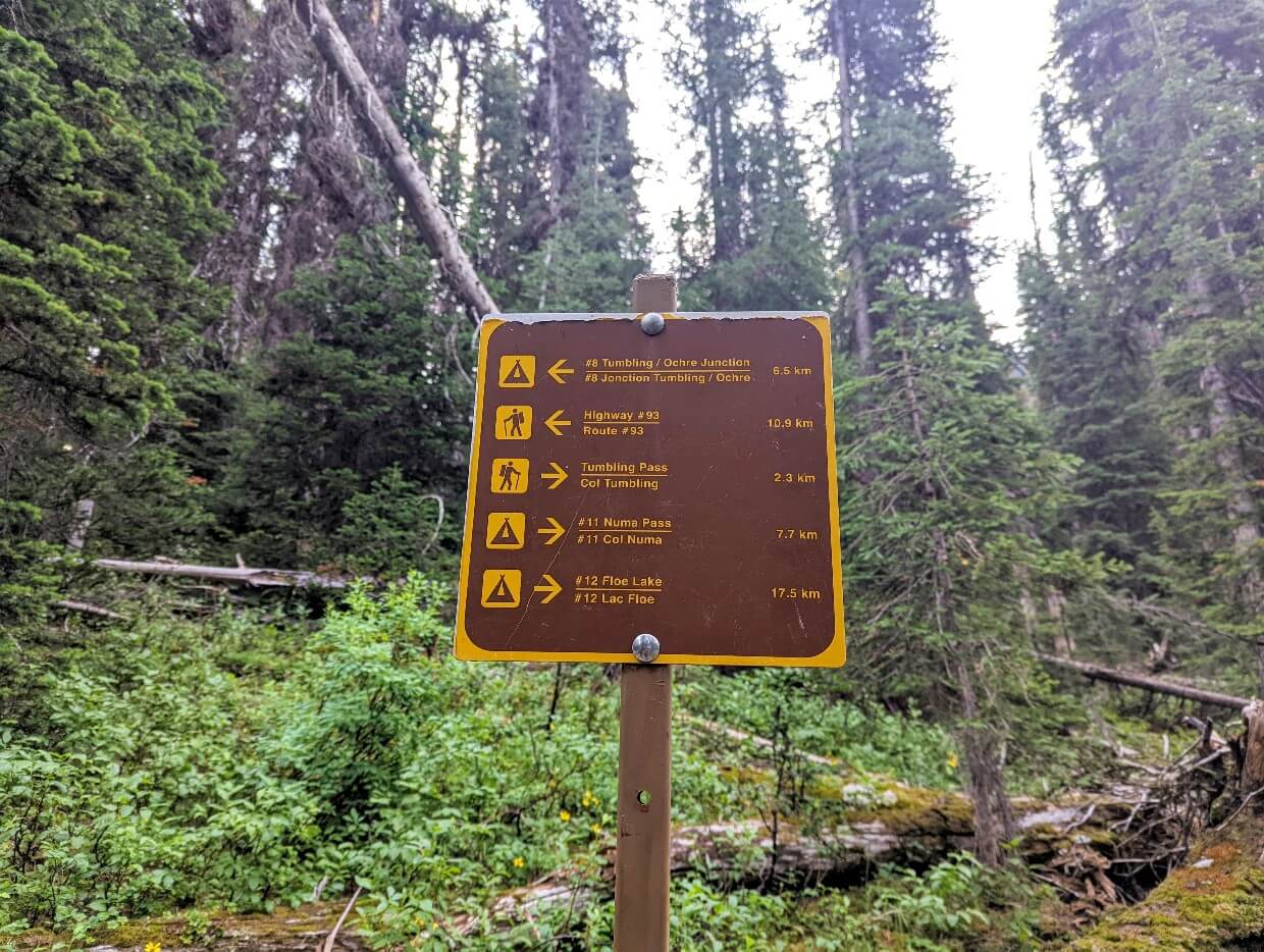 Close up of Rockwall Trail signage, with arrows and distances
