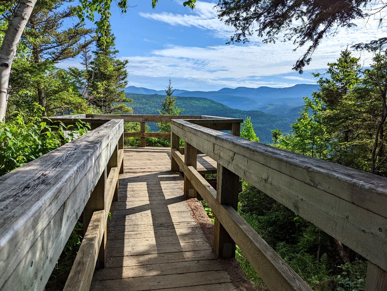 Wooden viewpoint platform on Saillie trail, one of the best Gaspe Peninsula hiking trails