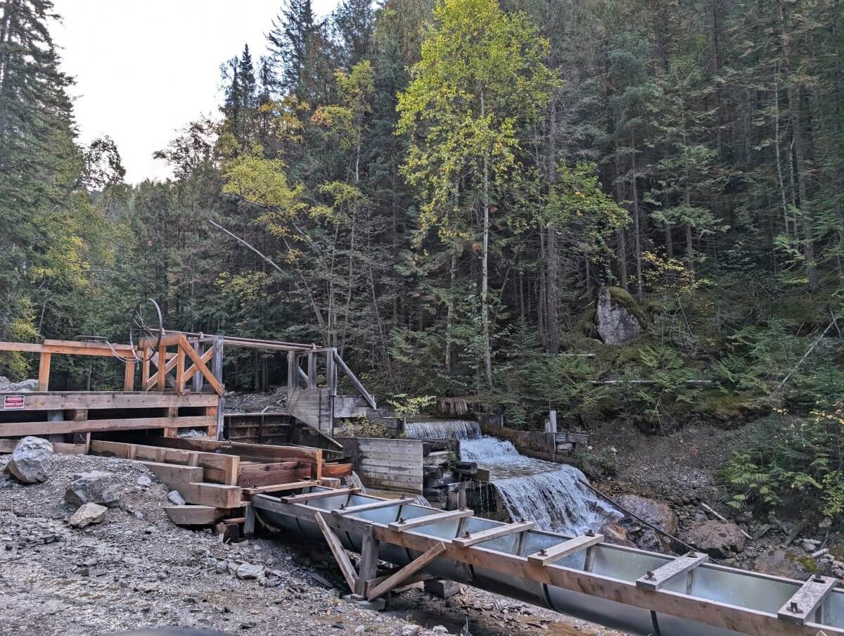 Close up of 100+ year old flume irrigation system on creek near Diana Lake