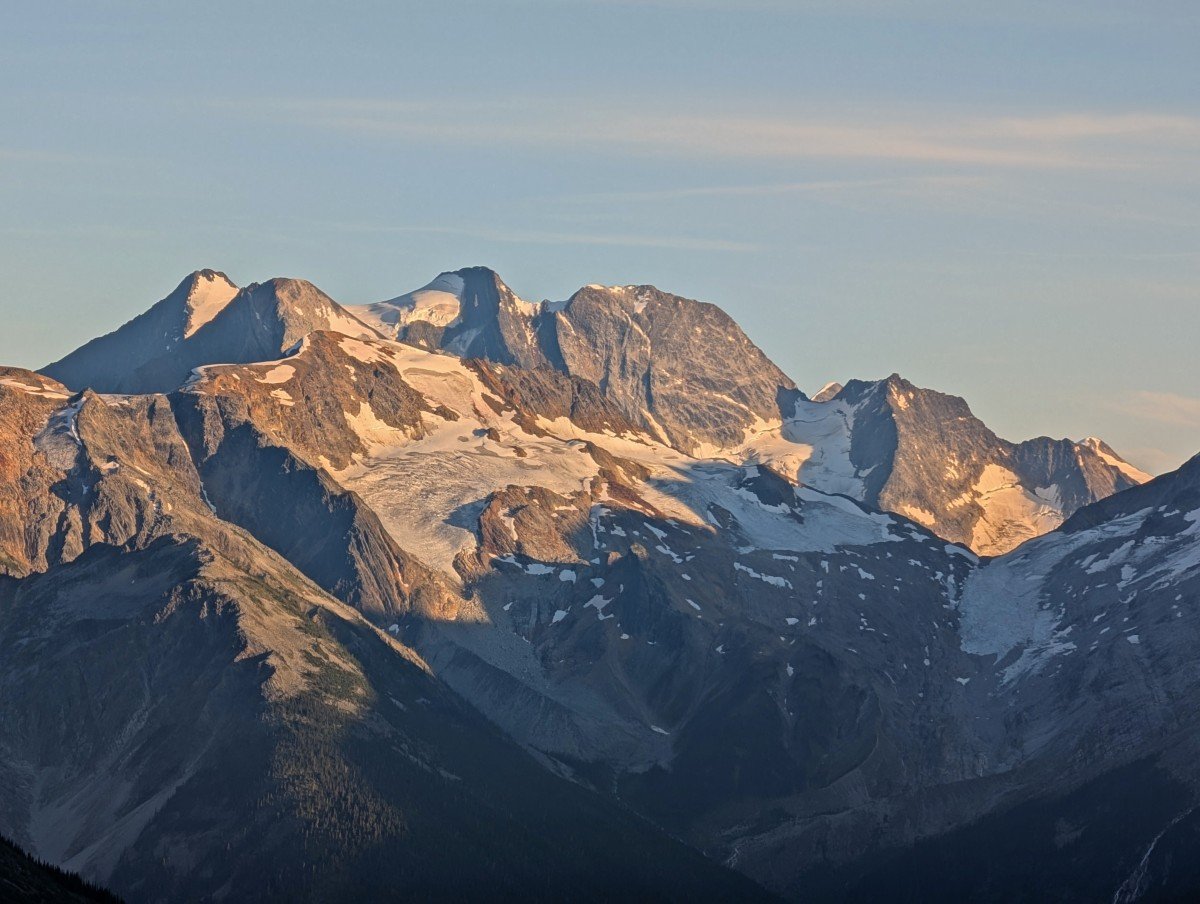 Close up of mountain and glacier view from Hermit Meadows campground at sunset